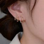 Yasmin | Claw-style earrings with zircons