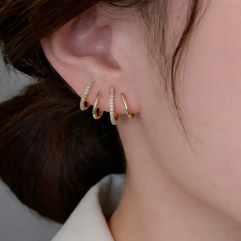 Yasmin | Claw-style earrings with zircons