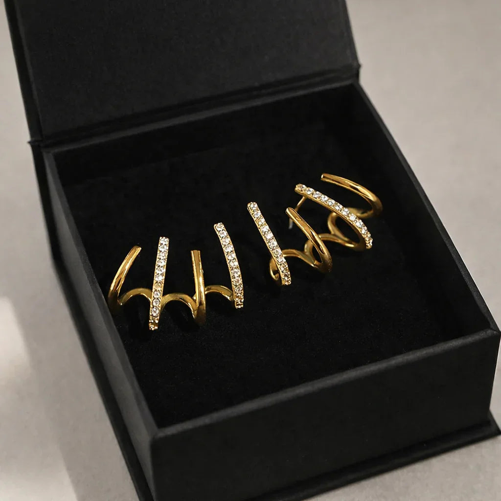 Yasmin | Claw-style earrings with zircons