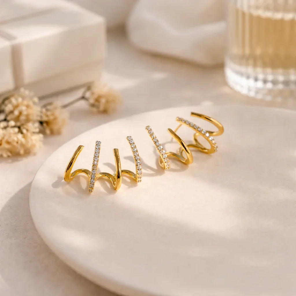Yasmin | Claw-style earrings with zircons