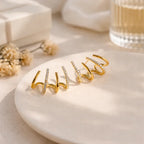 Yasmin | Claw-style earrings with zircons