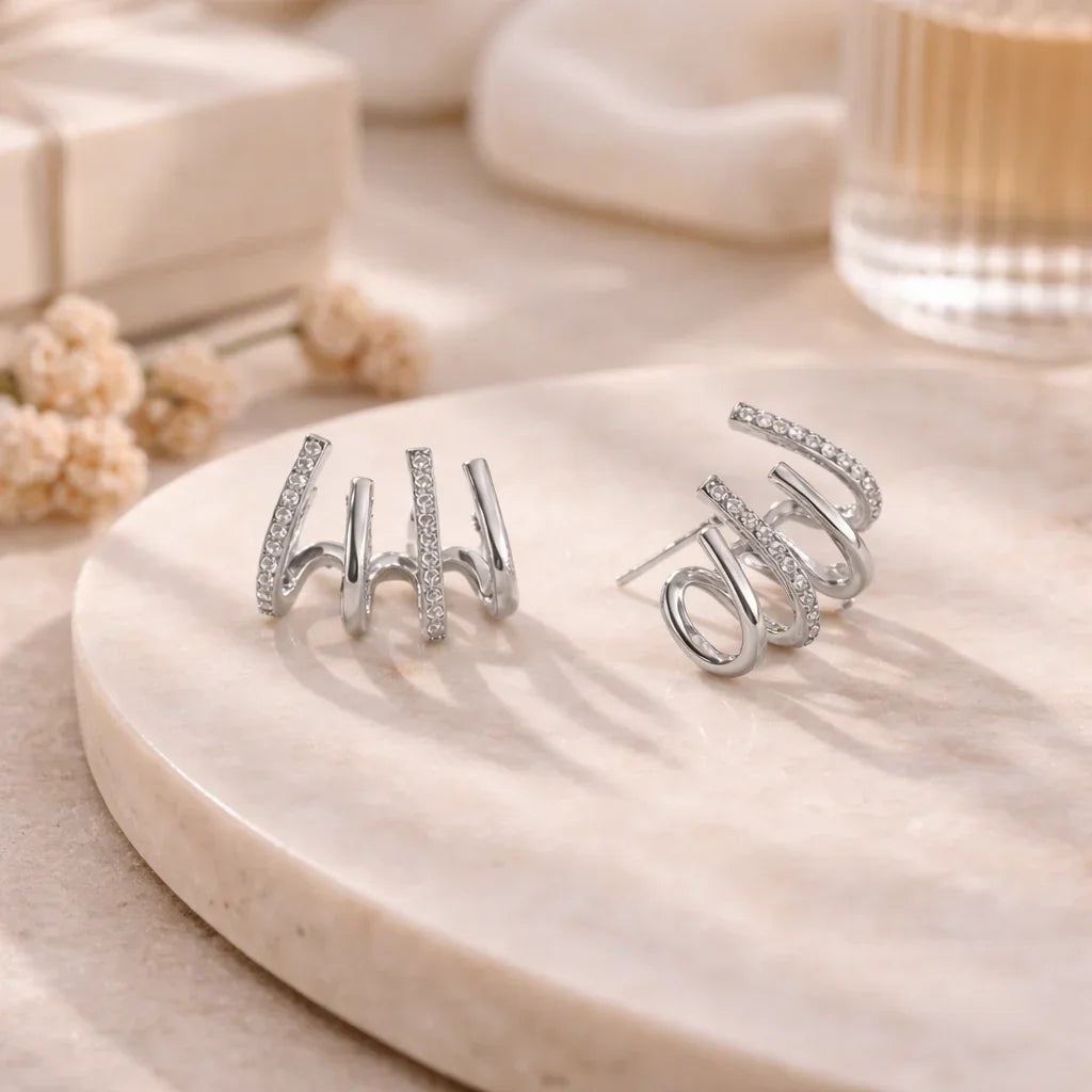 Yasmin | Claw-style earrings with zircons